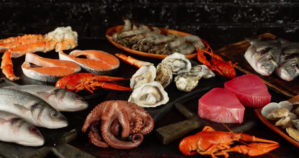 The Types of Different Seafood and Fish on Table Rotate