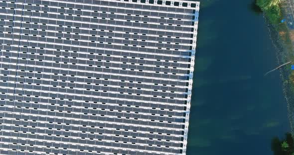 Panorama view on panels floating on water with floating solar panels
