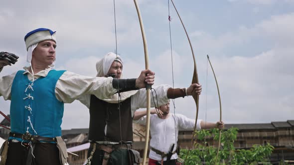 Group of medieval archers are training on archery