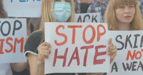 Crowd of Activists Protesting Against Social Inequality on Covid-19 Pandemic. Caucasian People with