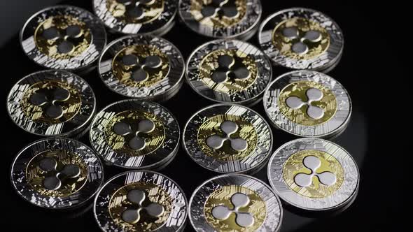 Rotating shot of Bitcoins (digital cryptocurrency) - BITCOIN RIPPLE 