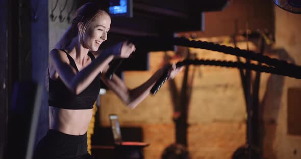 Sporty Woman Exercising At Functional Training Gym