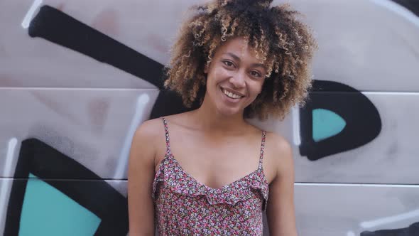 Sensual Modern Black Woman in Dress on Street