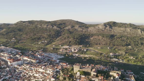 Aerial drone view of Castelo de Vide in Alentejo, Portugal and Serra de Sao Mamede mountains on the