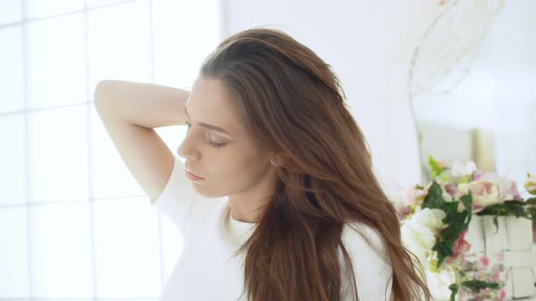 Young Beautiful Girl in White Decor