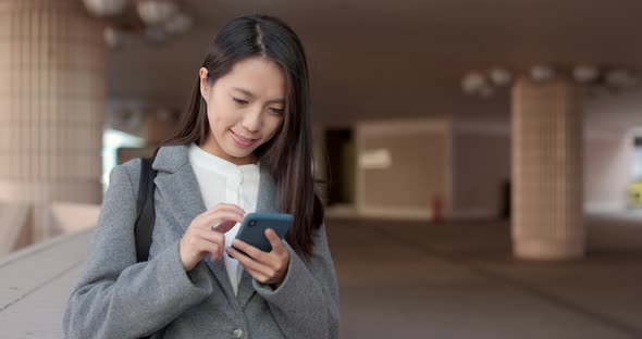 Young Business woman use of mobile phone at outdoor