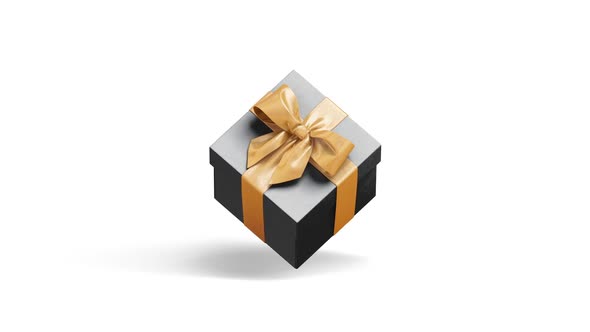 Blank black gift box with gold ribbon, looped rotation