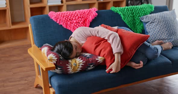 Housewife Sleep on Sofa at Home
