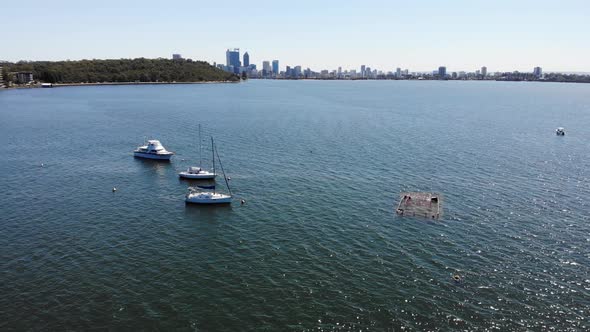 Aerial view of Boats by the City in Australia	