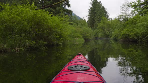 Adventure Concept Kayaking in Red Kayak