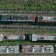 Aerial Top Down Shot of an Abandoned Rusty Locomotives and Old Railways - VideoHive Item for Sale