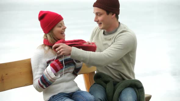 Couple prepares to go ice skating