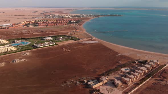 Flying from above over the hotel and the desert near Hurghada.