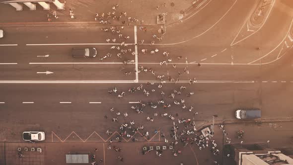 People at Sun Crossroad Top Down Aerial