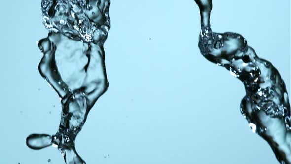 Water pouring and splashing in ultra slow motion 1500fps on a reflective surface - WATER POURS 171