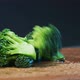 Fresh Green Broccoli Pieces with Water Drops Fall on Board - VideoHive Item for Sale