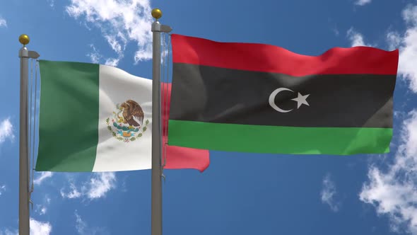 Mexico Flag Vs Libya Flag On Flagpole