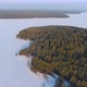 Flight Over a Taiga Forest Lake in Winter - VideoHive Item for Sale