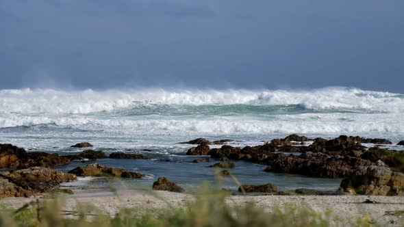 large waves crashing on beach