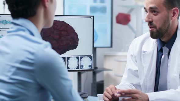 Caucasian Physician Talking About Brain Damage