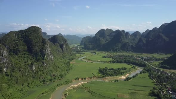 Aerial Endless Valley Landscape with Fields River at Hills