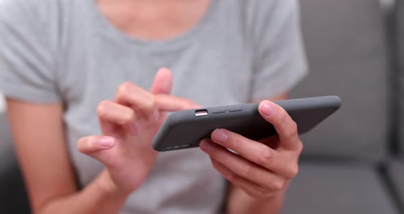 Close up of woman using mobile phone