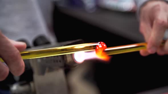 Glassblower. Craft Manufacturing of Glass Products