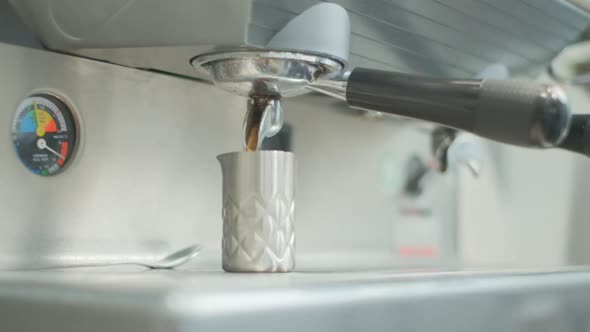 Barista Makes Coffee on a Coffee Machine