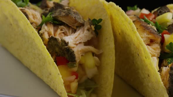 Rotating shot of delicious, fish tacos
