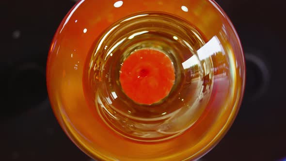 Red Blown Glass Rotates on Machinery