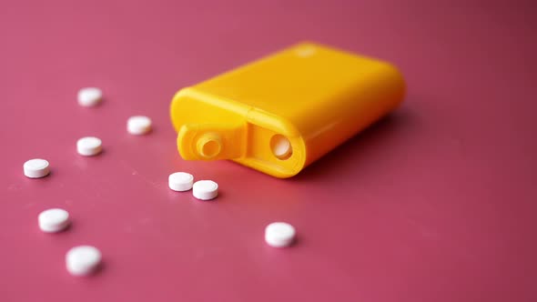 Artificial Sweetener Container on Red Background