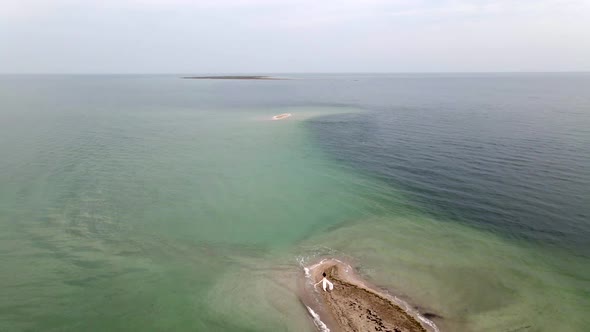 Bride at Uninhabited Sand Island in Ocean Reef  Drone High Ungraded Video