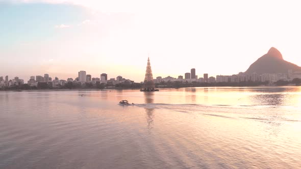 Landscape with the worlds tallest floating Christmas tree of 2018 in Rio de Janeiro with a speedboat