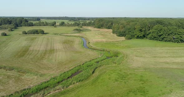 Aerial view of small winding river Reest.