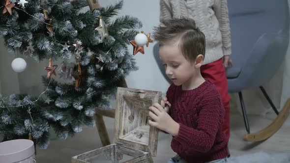 Children with New Year's gifts, happy friends for Christmas