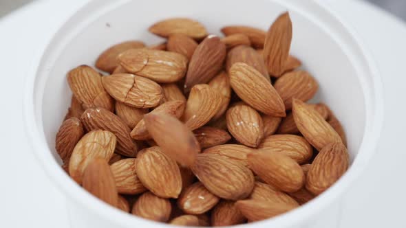 Almonds falling in slow motion