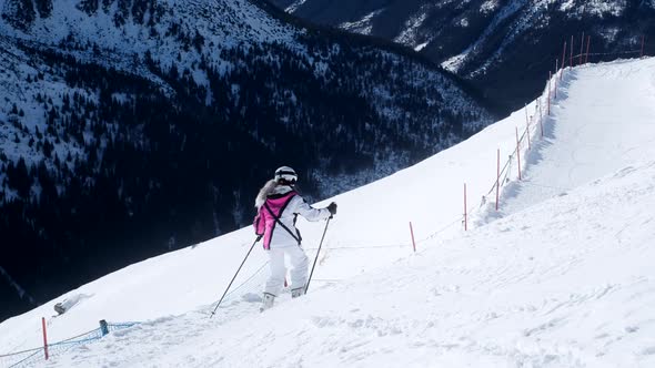 Skie Woman are Skiing on the Slopes in the Mountains Mountain Downhill  60p