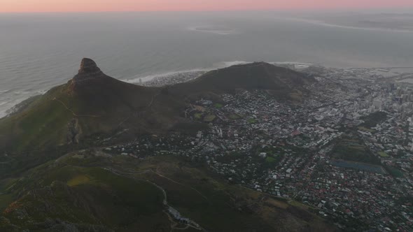 Aerial Panoramic Footage of City on Ocean Coast at Twilight