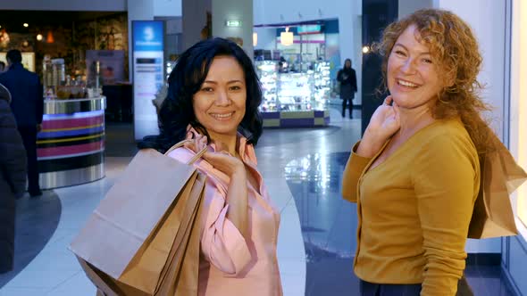Women Turn Back at the Mall