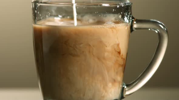 Milk poured into coffee in ultra slow motion 1500fps - COFFEE w MILK PHANTOM 
