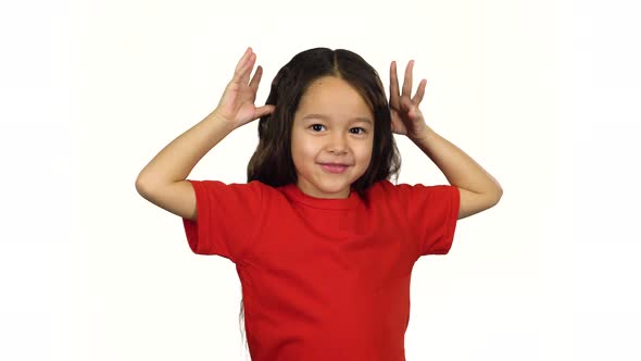 Portrait of Happy Little Girl Smile, Have Fun and Act the Ape