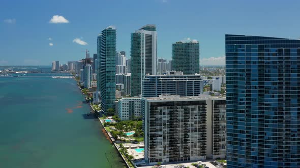 Modern Architecture Waterfront Buildings on Summer Sunny Day with Blue Bay View