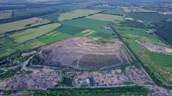 Opencast Granite Mining Quarry with Working Machinery