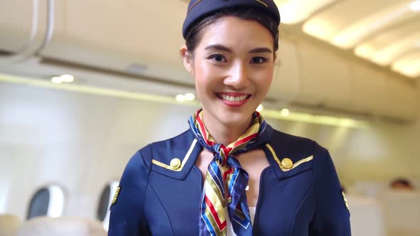 Cabin Crew or Air Hostess Working in Airplane