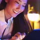Young Asian beautiful woman enjoy using smartphone- tablet   in bedroom at night time. - VideoHive Item for Sale