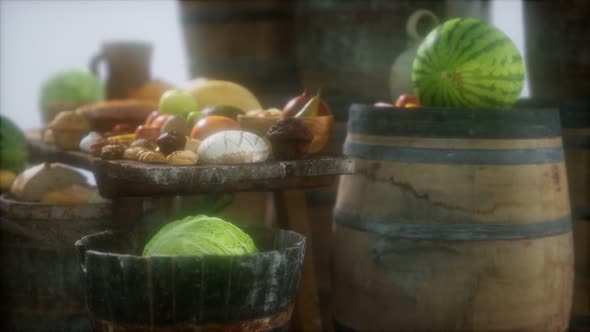 Food Table with Wine Barrels and Some Fruits, Vegetables and Bread alt
