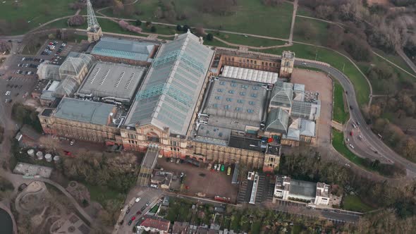 Dolly back pan up aerial shot of alexandra palace