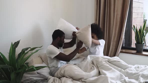 Couple pillow fight