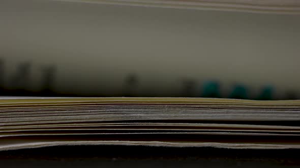 Turned Pages of an Open Book Close Up