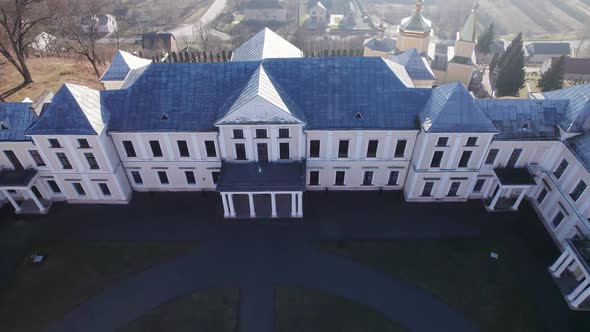 Front Aerial View of the Vyshnivets Palace Ukraine in Autumn